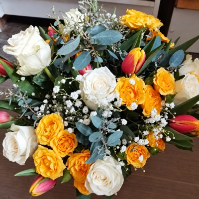 Tulip delight - Handtied bouquet of spring tulips spray roses single roses gypsophila and greenery